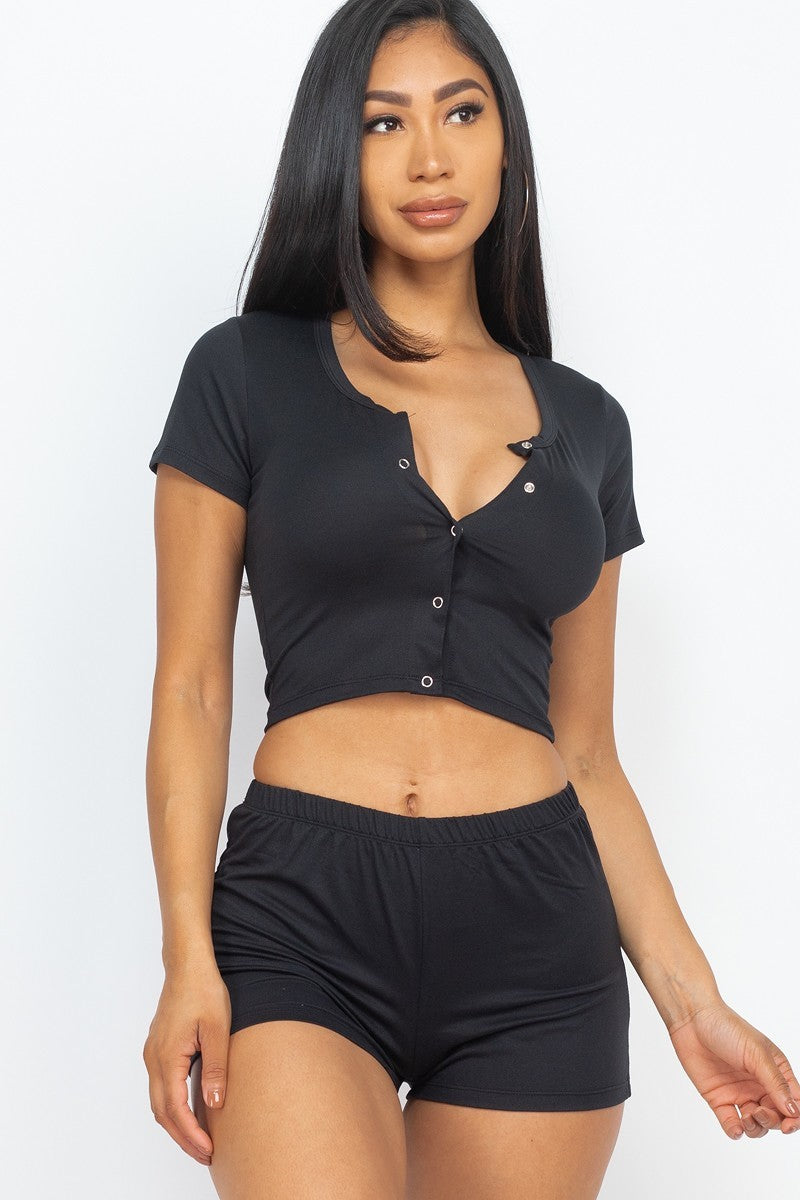 Women's black crop top and shorts set with soft and stretchy fabric