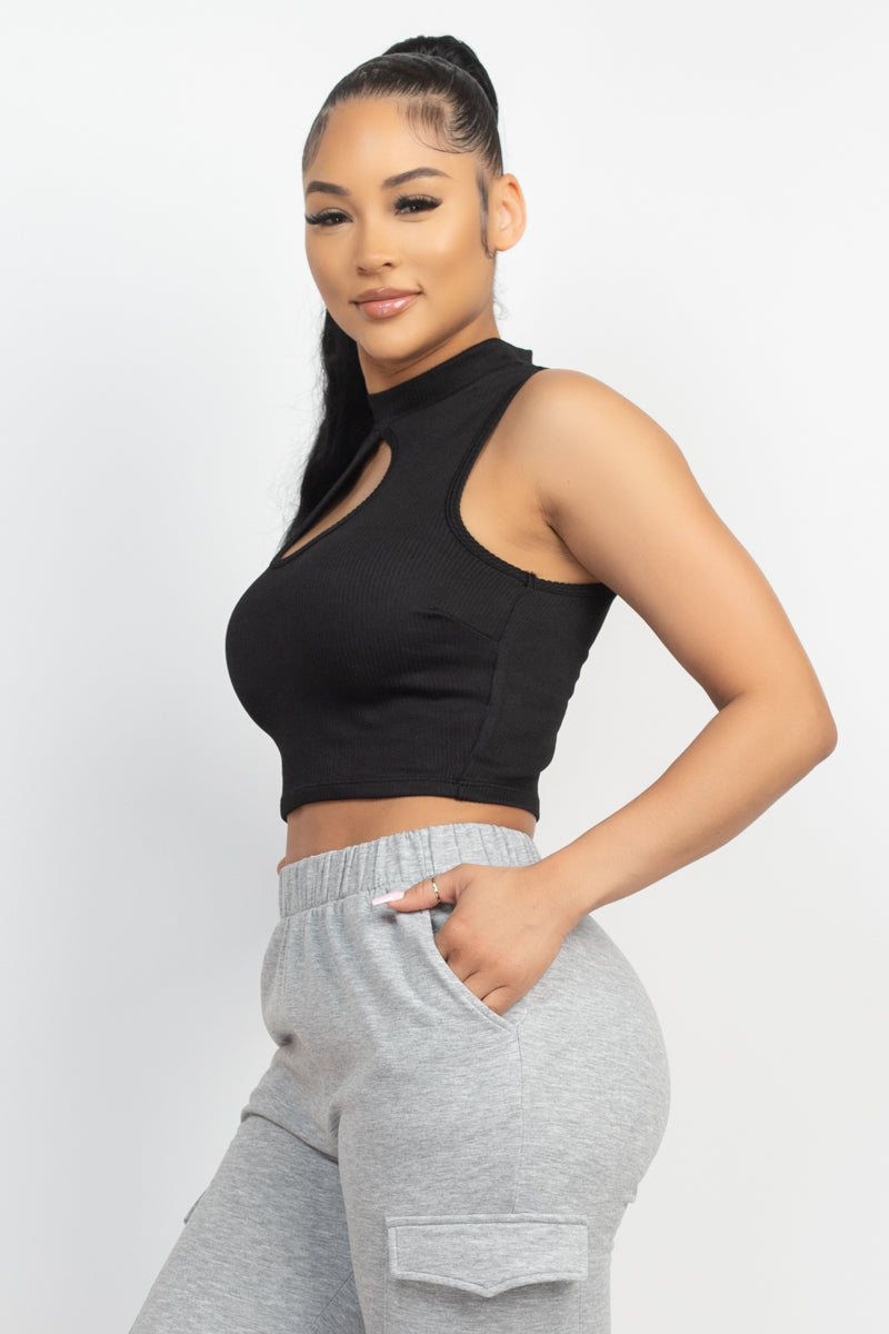 Women's black fashionable rib stretch knit crop top featuring a front keyhole, a mock neckline and a sleeveless cut