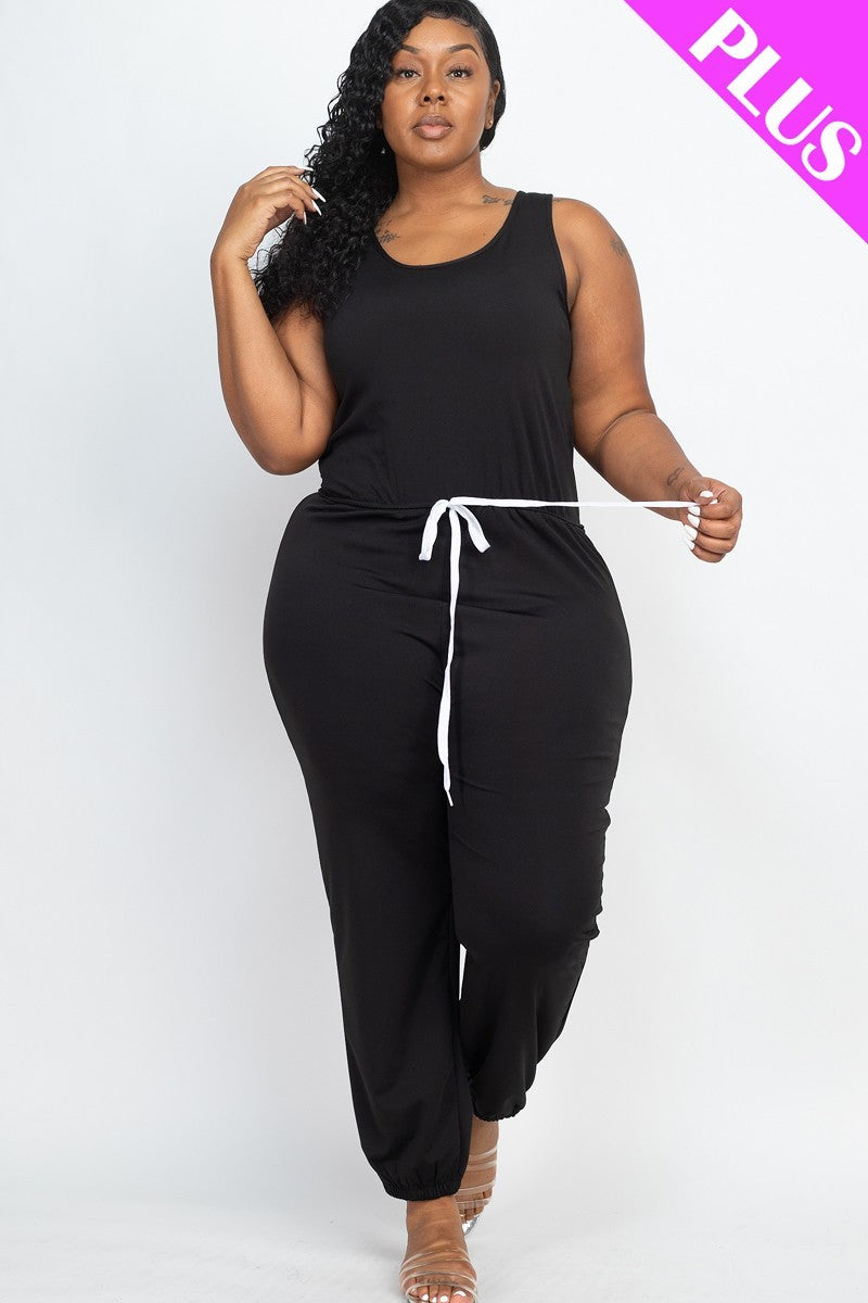Women's plus size black jogger jumpsuit features an elasticized waist and very soft, stretchy and light weight double knit jersey fabric